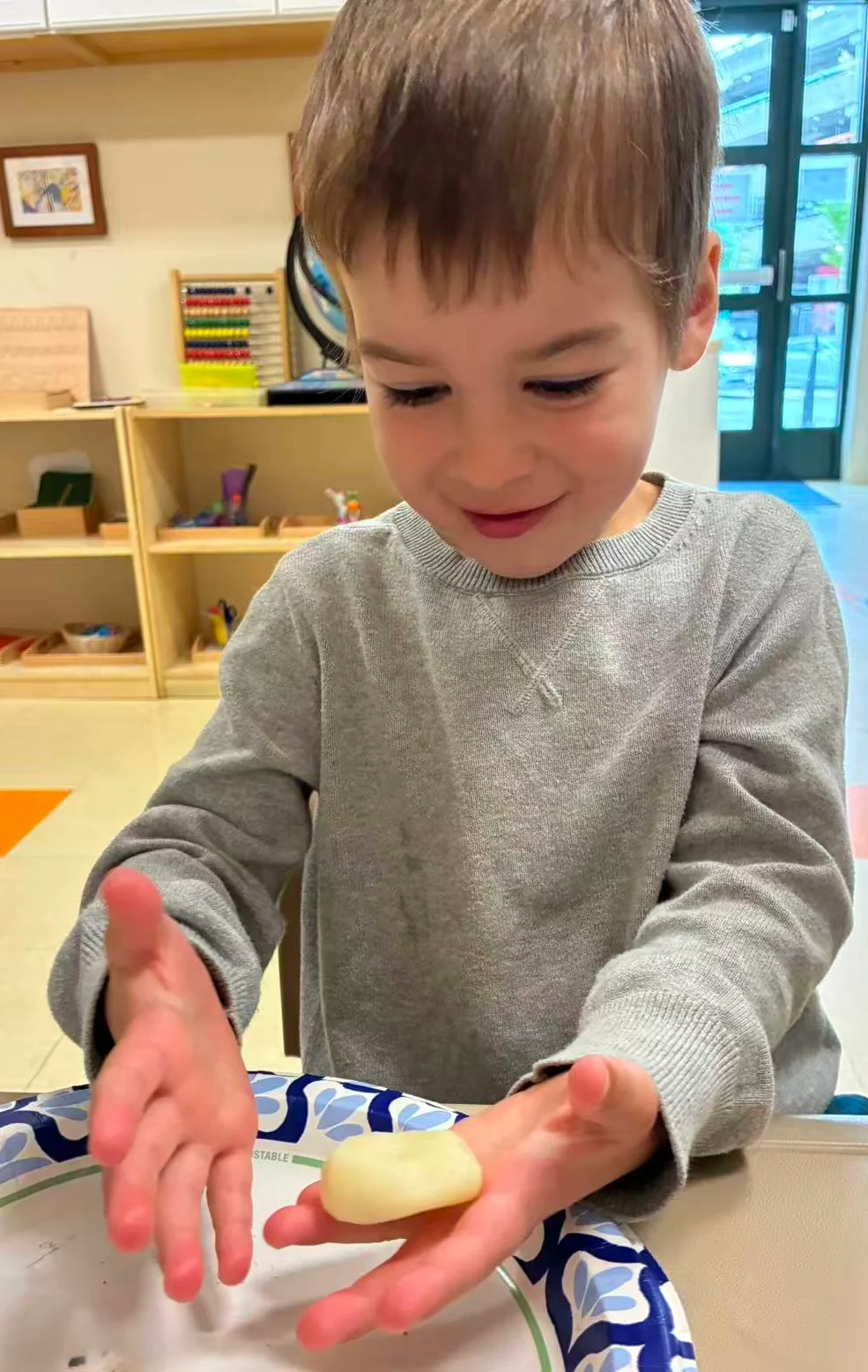 Children learning together in an illustrative Montessori classroom